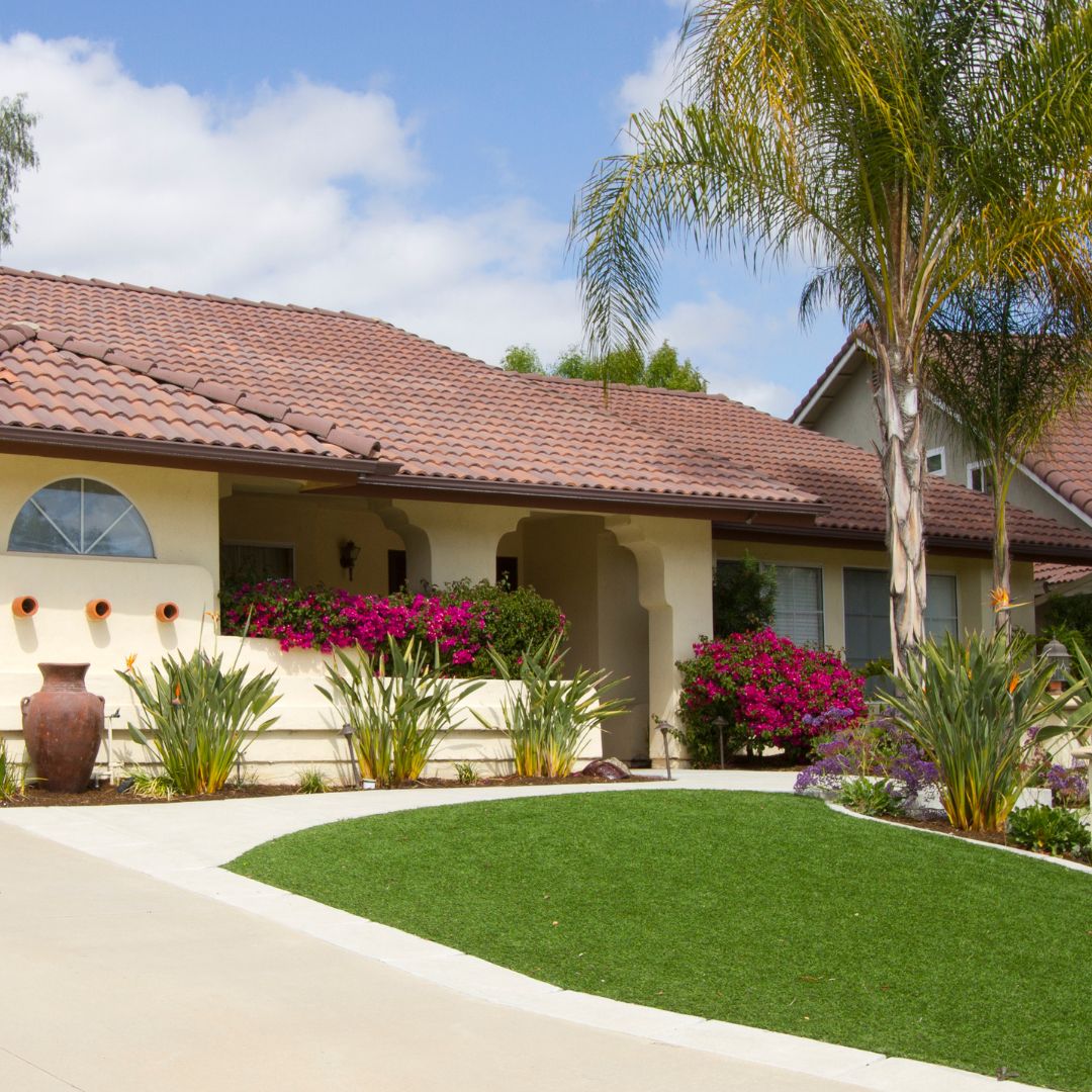 home with small artificial lawn