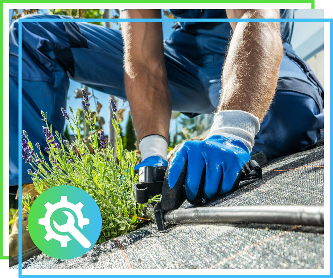 Technician performing maintenance on a drip irrigation system